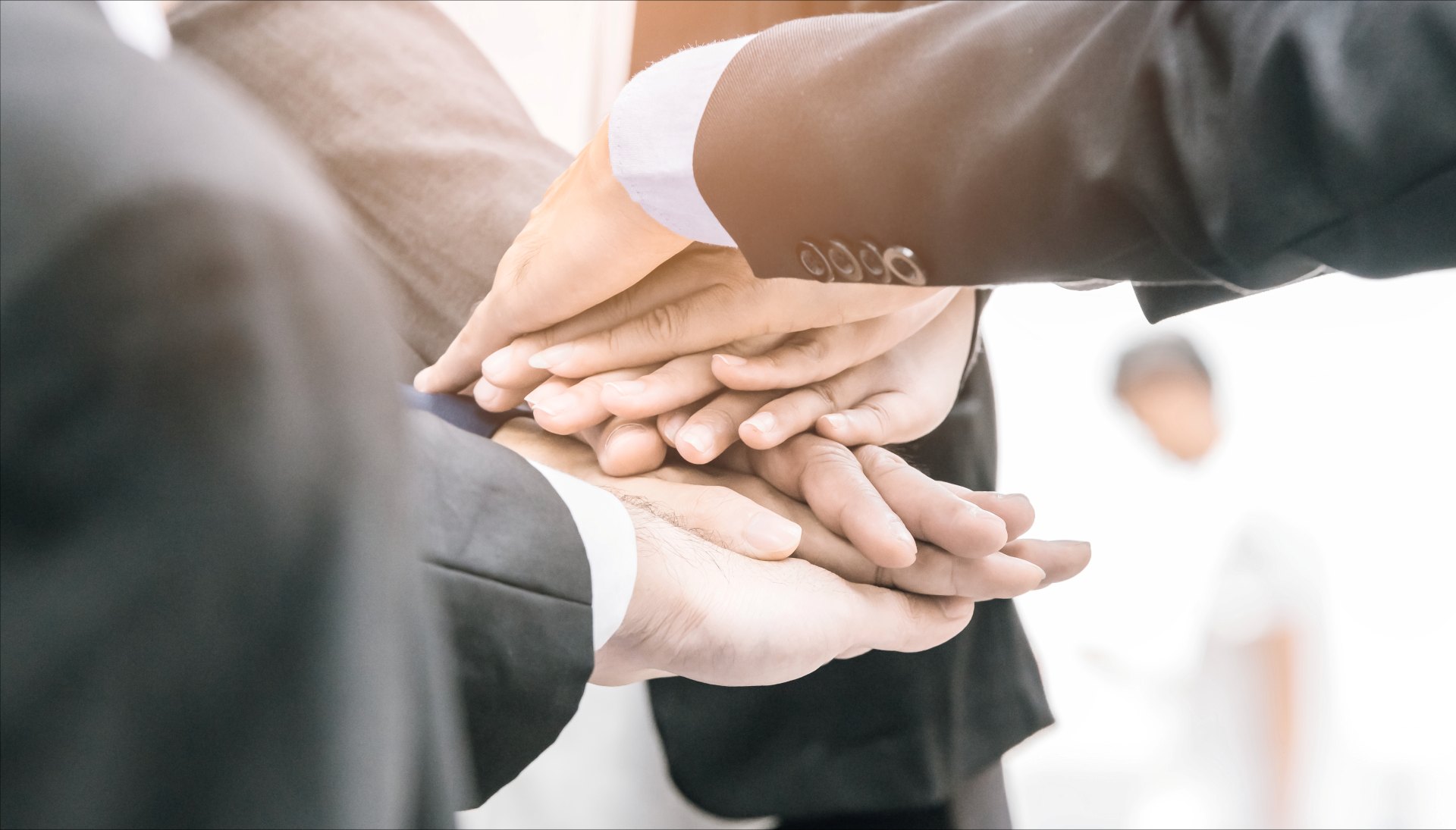 Business Colleagues Stacking Hands